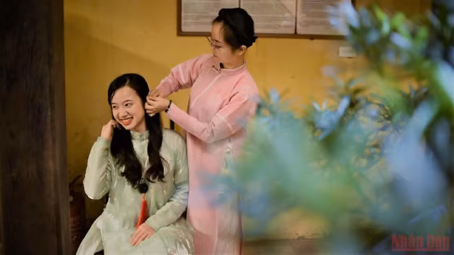 越南年轻人生活中的五体奥黛（组图） ảnh 1