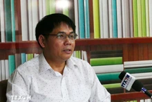 在老越资企业协会副主席黄文军。（图片来源：越通社）