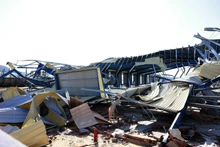 受第13号台风影响，仁会经济区内许多生产厂房遭受损坏。