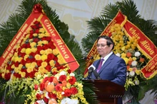 政府总理范明正在会上发表讲话。（陈海 摄）