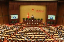 经过一个多月的认真、紧张和高度负责的工作，第十五届国会第九次会议于6月27日在首都河内闭幕。（维灵 摄）