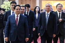 范明正总理和中国山东省委书记林武。