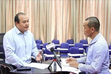 金边皇家大学国际安全与公共政策研究院研究员通·孟格达维德(Thong Mengdavid)接受越通社记者采访。(图片来源:越通社)
