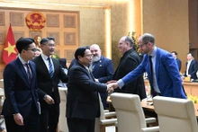 范明正总理和各位瑞士企业家。