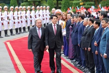 越南国家主席梁强主持隆重仪式 欢迎联合国秘书长正式访越。(水原 摄)