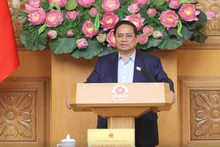 范明正总理发表讲话。(图片来源:VGP)