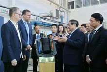 范明正总理造访瑞典皇家工学院核能安全研究室。（图片来源：越通社）