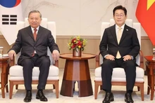 越共中央总书记苏林和韩国总统李在明。（图片来源：越通社）