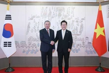 越共中央总书记苏林与韩国总统李在明。（图片来源：越通社）