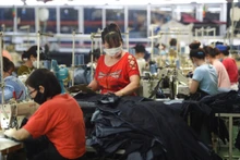 越南纺织服装与皮鞋企业力争站稳本土市场