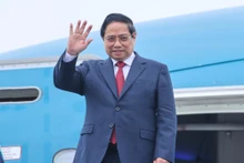 政府总理范明正回到河内，圆满结束对俄罗斯联邦的正式访问之行。（图片来源：VGP）