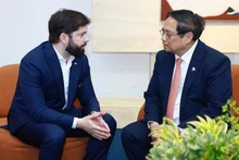 范明正总理会见智利总统加夫列尔·博里奇·丰特。(图片来源:政府网)