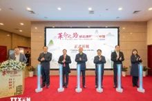 “革命之路——胡志明同志在中国”专题展在重庆举行。（图片来源：越通社）