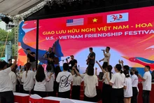 越美友好交流活动在胡志明市举行。（图片来源：htv.com.vn）