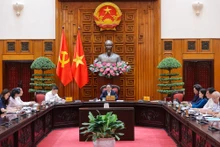 范明正总理主持会议。（图片来源：VGP）