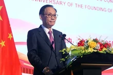 越共中央书记处书记、外交部代理部长黎怀忠发表讲话。（图片来源：越通社）