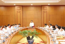 越共中央政治局委员、中央书记处常务书记陈锦秀10月16日主持的一场会议。