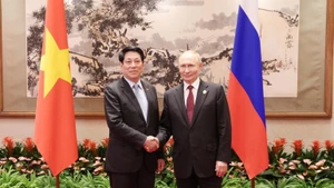 越南国家主席梁强会见俄罗斯总统普京。（图片来源：越通社）