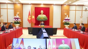 越共中央总书记苏林与柬埔寨人民党主席洪森通电话。（图片来源：越通社）