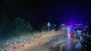 庆和省庆黎山口山体滑坡事故现场。（图片来源：越通社）