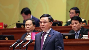 越南工贸部党委书记、代理部长黎孟雄发表讲话。（图片来源：laodong.vn）