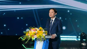 越南国家工业与能源集团董事会主席黎玉山发表讲话。（图片来源：baochinhphu.vn）