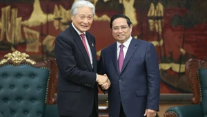 越南政府总理范明正会见日本栃木县知事福田富和。（图片来源：VGP）