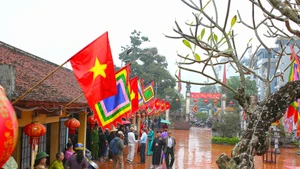 新春赶氏禁村庙会 为生火煮饭比赛加油助威【组图】