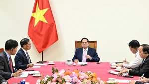越南政府总理范明正与马来西亚总理安瓦尔·易卜拉欣通电话【组图】