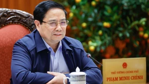 范明正总理主持会议。（图片来源：越南人民军队报）