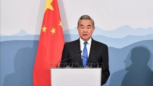 中共中央政治局委员、外交部长王毅。（图片来源：越通社）