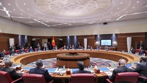 会谈场景。（图片来源：laodong.vn）