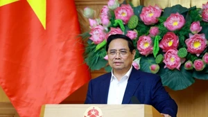 范明正总理在会议上发表讲话。（图片来源：越通社）