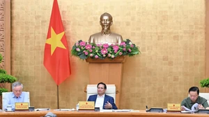 范明正总理主持会议。