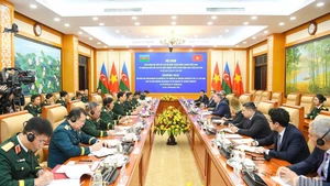 会谈场景。（图片来源：qdnd.vn）