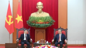 越共中央总书记苏林会见中共中央宣传部部长李书磊。