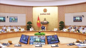 会议场景。（图片来源：qdnd.vn）