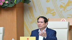 范明正总理主持会议。