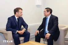 越南政府总理范明正于当地时间6月9日会见了法国总统埃马纽埃尔·马克龙。(图片来源:越通社)