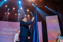 文郎大学荣获国家主席授予的二级劳动勋章。（图片来源：文郎大学）