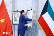 越南政府总理范明正与科威特首相谢赫·艾哈迈德·阿卜杜拉·艾哈迈德·萨巴赫。