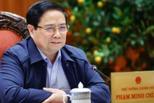 范明正总理主持会议。（图片来源：越南人民军队报）