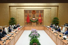 越南政府总理范明正会见中国外交部长、国防部长和公安部长。（图片来源：越通社）