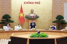 越南政府总理范明正主持会议。（图片来源：越通社）