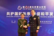 国防部长潘文江大将于9月18日下午与中国国防部长董军上将举行双边会晤。（图片来源：越通社）