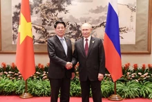 越南国家主席梁强会见俄罗斯总统普京。（图片来源：越通社）