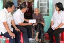 喜迎越共十四大和2026丙午年春节：全国超588万人已收到党和国家慰问金。（图片来源：越通社）