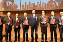 参加活动的各位代表。（图片来源：越通社）