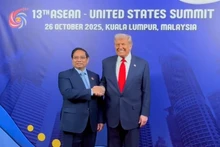越南政府总理范明正会见美国总统特朗普。（图片来源：VGP）