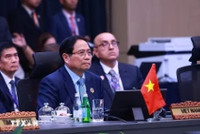 越南政府总理范明正出席第22届东盟-印度峰会。